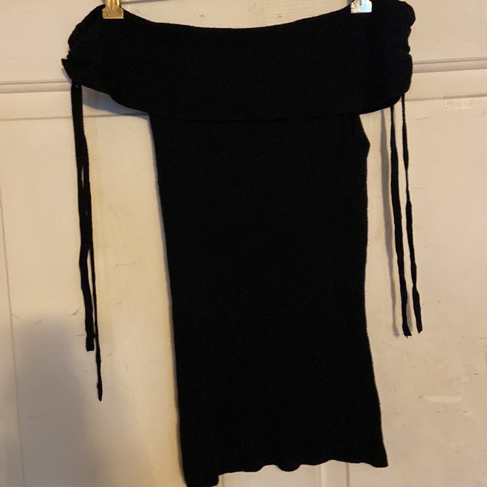 Express off shoulder ribbed black sweater with lace up details on shoulder.